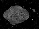 Haumea a její měsíc Namaka (foto: Arnaugir, wikimedia.org)