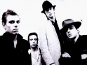 The Clash, zleva Paul Simonon, Mick Jones, Nicky "Topper" Headon, Joe Strummer, přelom 70. - 80. let