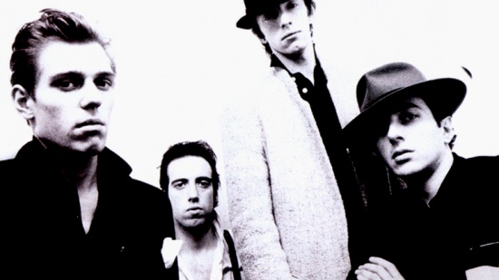 The Clash, zleva Paul Simonon, Mick Jones, Nicky "Topper" Headon, Joe Strummer, přelom 70. - 80. let
