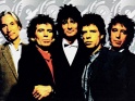 Rolling Stones (zleva Charlie Watts, Keith Richards, Ron Wood, Mick Jagger, Bill Wyman, 1989-90)